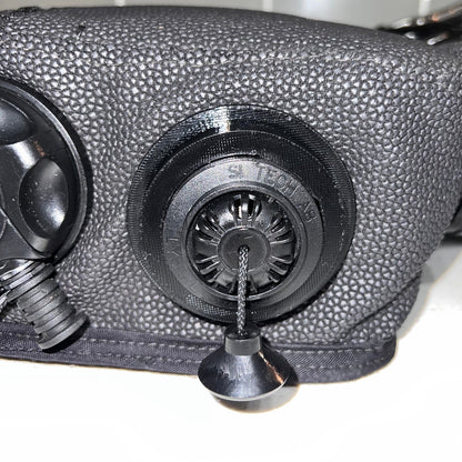 Black Pull Dump retention ring installed on a re-breather