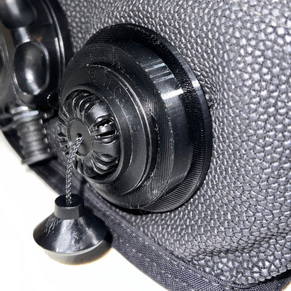 Black Pull Dump retention ring installed on a re-breather